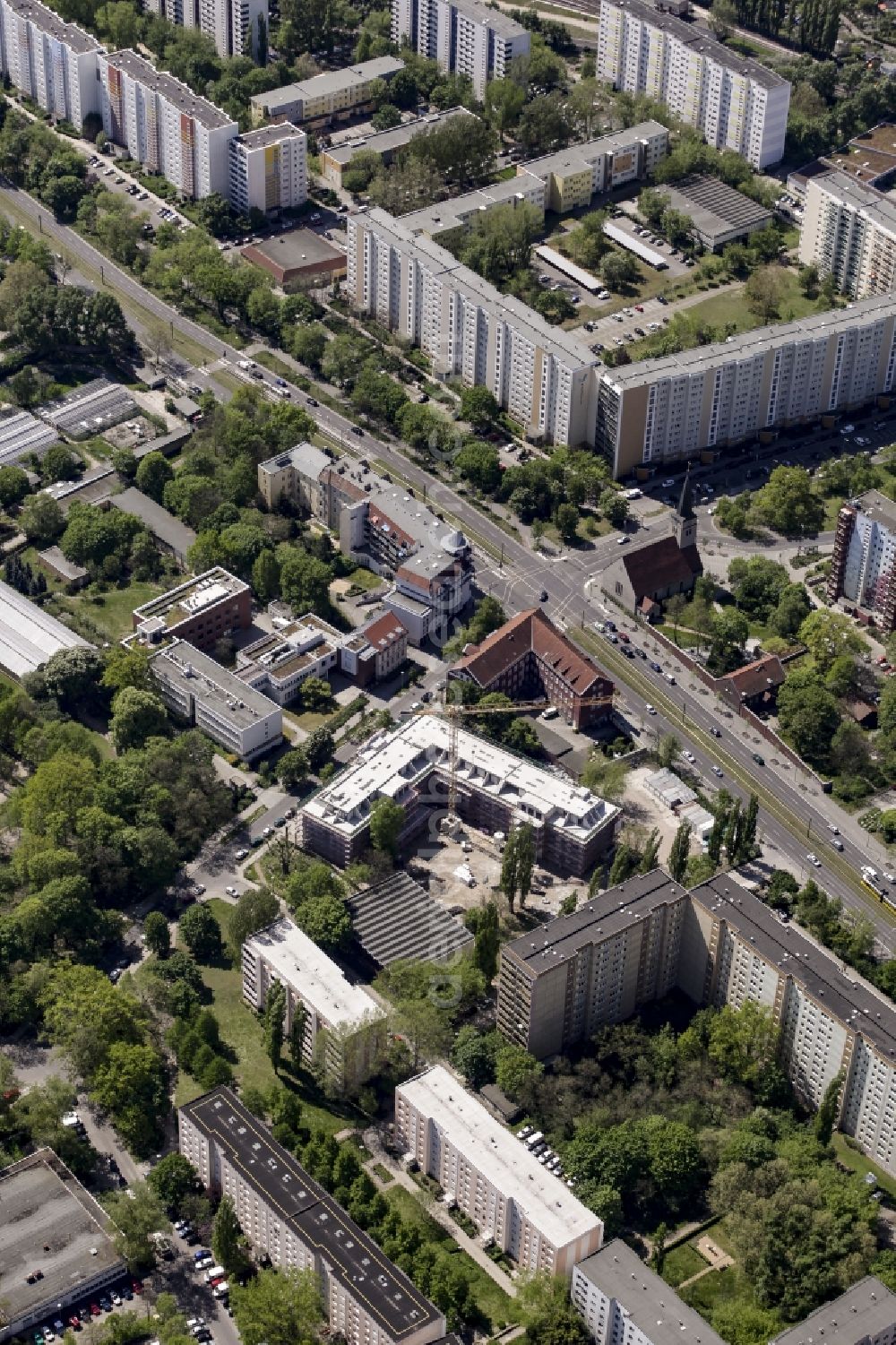 Berlin from the bird's eye view: Construction site of a new DOMICIL care and nursing home for the elderly on Alfred-Kowalke-Strasse in the district of Lichtenberg in Berlin, Germany. Its owner is HBB Hanseatische Gesellschaft fuer Seniorenheime mbH & Co. KG, BATEG GmbH is the main developer