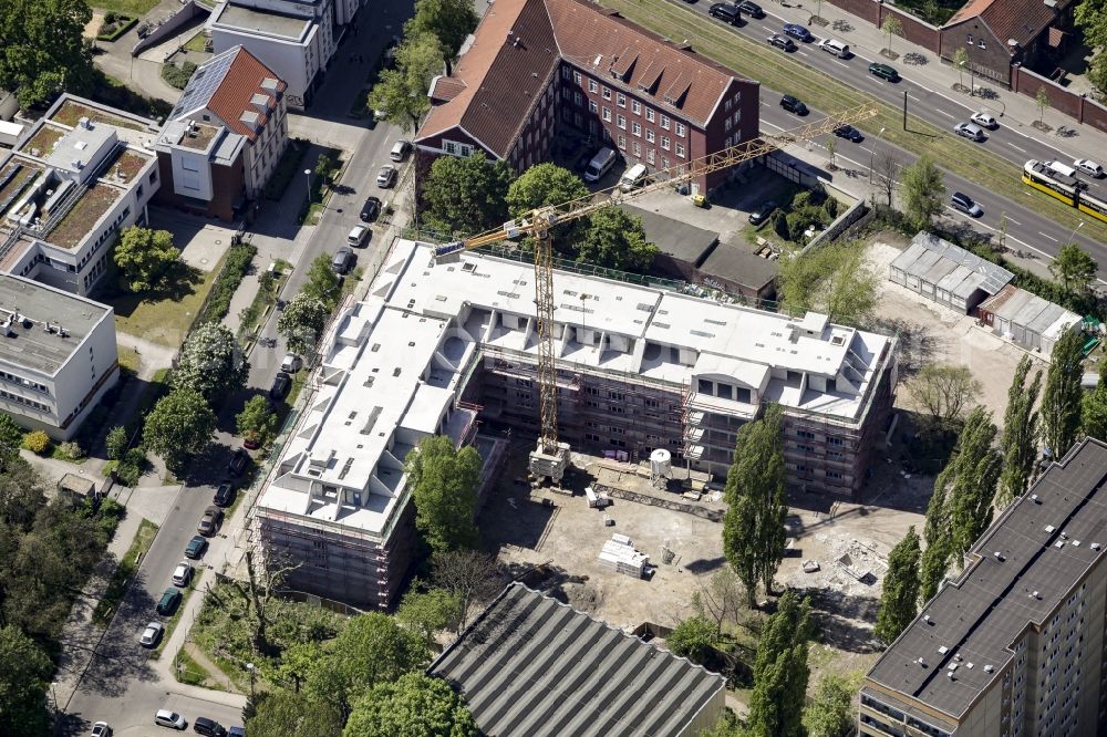 Aerial image Berlin - Construction site of a new DOMICIL care and nursing home for the elderly on Alfred-Kowalke-Strasse in the district of Lichtenberg in Berlin, Germany. Its owner is HBB Hanseatische Gesellschaft fuer Seniorenheime mbH & Co. KG, BATEG GmbH is the main developer