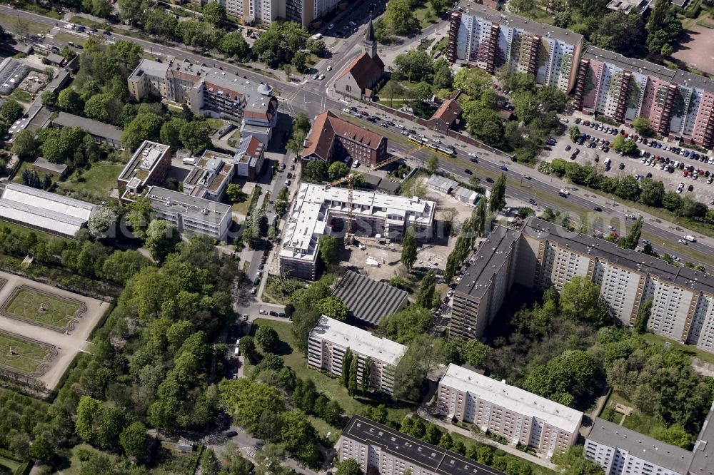 Aerial photograph Berlin - Construction site of a new DOMICIL care and nursing home for the elderly on Alfred-Kowalke-Strasse in the district of Lichtenberg in Berlin, Germany. Its owner is HBB Hanseatische Gesellschaft fuer Seniorenheime mbH & Co. KG, BATEG GmbH is the main developer