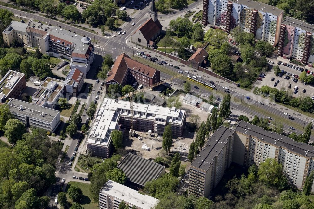 Berlin from above - Construction site of a new DOMICIL care and nursing home for the elderly on Alfred-Kowalke-Strasse in the district of Lichtenberg in Berlin, Germany. Its owner is HBB Hanseatische Gesellschaft fuer Seniorenheime mbH & Co. KG, BATEG GmbH is the main developer