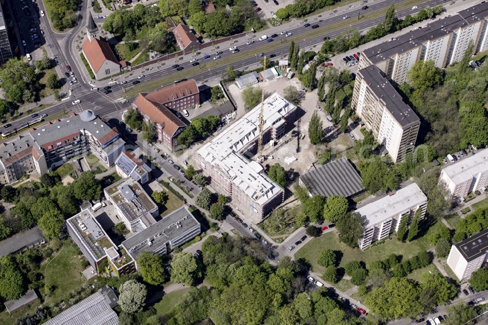 Berlin from above - Construction site of a new DOMICIL care and nursing home for the elderly on Alfred-Kowalke-Strasse in the district of Lichtenberg in Berlin, Germany. Its owner is HBB Hanseatische Gesellschaft fuer Seniorenheime mbH & Co. KG, BATEG GmbH is the main developer