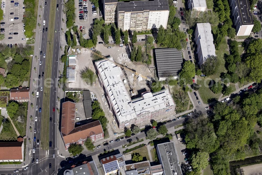 Berlin from above - Construction site of a new DOMICIL care and nursing home for the elderly on Alfred-Kowalke-Strasse in the district of Lichtenberg in Berlin, Germany. Its owner is HBB Hanseatische Gesellschaft fuer Seniorenheime mbH & Co. KG, BATEG GmbH is the main developer