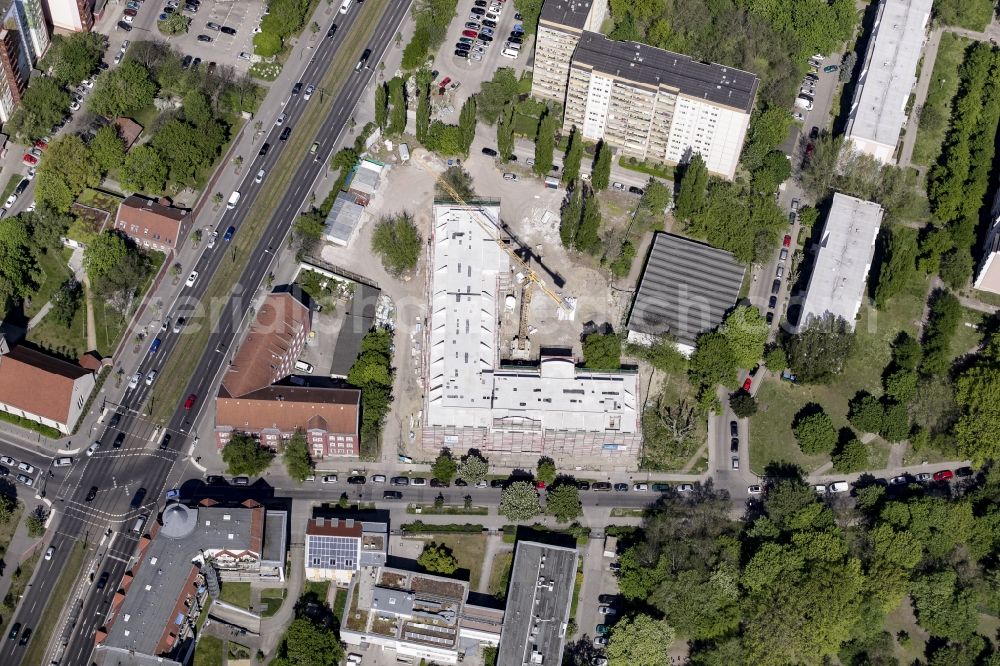 Berlin from the bird's eye view: Construction site of a new DOMICIL care and nursing home for the elderly on Alfred-Kowalke-Strasse in the district of Lichtenberg in Berlin, Germany. Its owner is HBB Hanseatische Gesellschaft fuer Seniorenheime mbH & Co. KG, BATEG GmbH is the main developer