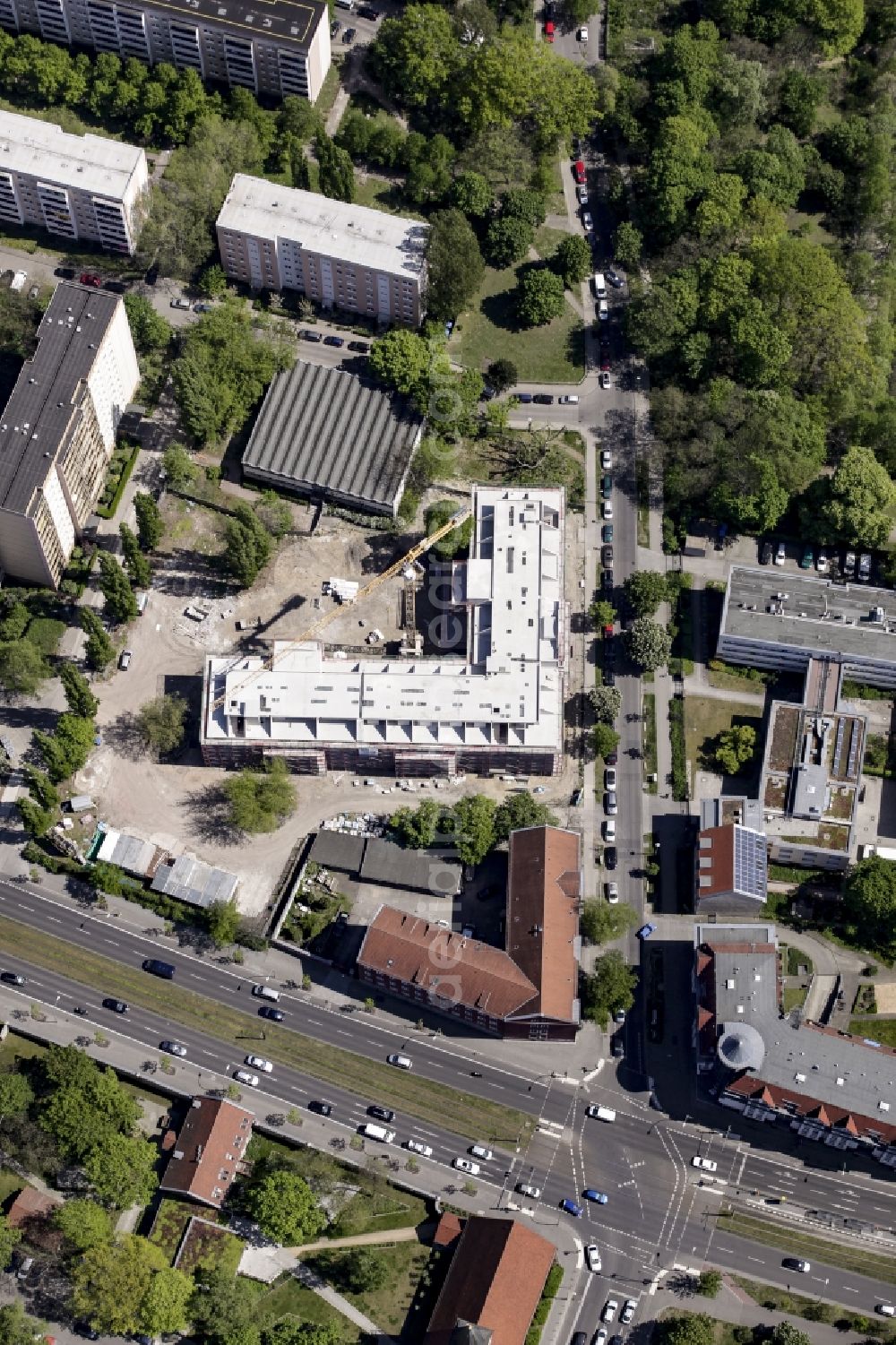 Aerial photograph Berlin - Construction site of a new DOMICIL care and nursing home for the elderly on Alfred-Kowalke-Strasse in the district of Lichtenberg in Berlin, Germany. Its owner is HBB Hanseatische Gesellschaft fuer Seniorenheime mbH & Co. KG, BATEG GmbH is the main developer