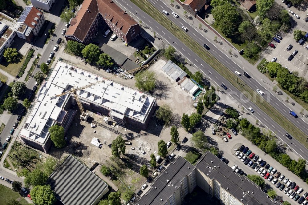 Aerial image Berlin - Construction site of a new DOMICIL care and nursing home for the elderly on Alfred-Kowalke-Strasse in the district of Lichtenberg in Berlin, Germany. Its owner is HBB Hanseatische Gesellschaft fuer Seniorenheime mbH & Co. KG, BATEG GmbH is the main developer