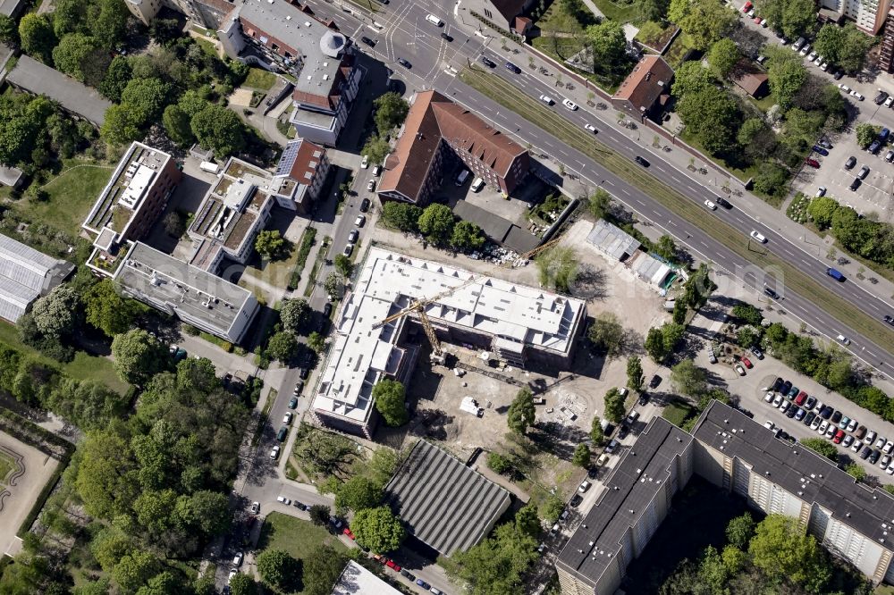 Aerial photograph Berlin - Construction site of a new DOMICIL care and nursing home for the elderly on Alfred-Kowalke-Strasse in the district of Lichtenberg in Berlin, Germany. Its owner is HBB Hanseatische Gesellschaft fuer Seniorenheime mbH & Co. KG, BATEG GmbH is the main developer