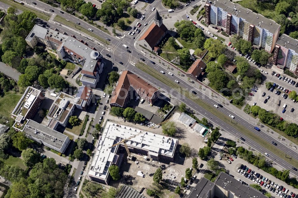 Berlin from above - Construction site of a new DOMICIL care and nursing home for the elderly on Alfred-Kowalke-Strasse in the district of Lichtenberg in Berlin, Germany. Its owner is HBB Hanseatische Gesellschaft fuer Seniorenheime mbH & Co. KG, BATEG GmbH is the main developer