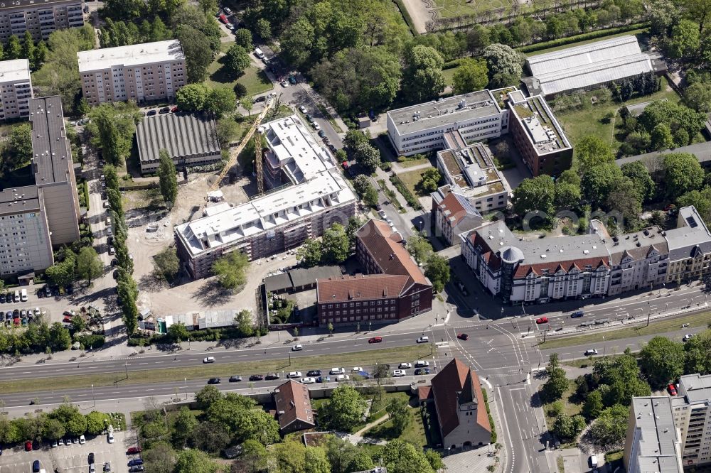 Berlin from the bird's eye view: Construction site of a new DOMICIL care and nursing home for the elderly on Alfred-Kowalke-Strasse in the district of Lichtenberg in Berlin, Germany. Its owner is HBB Hanseatische Gesellschaft fuer Seniorenheime mbH & Co. KG, BATEG GmbH is the main developer