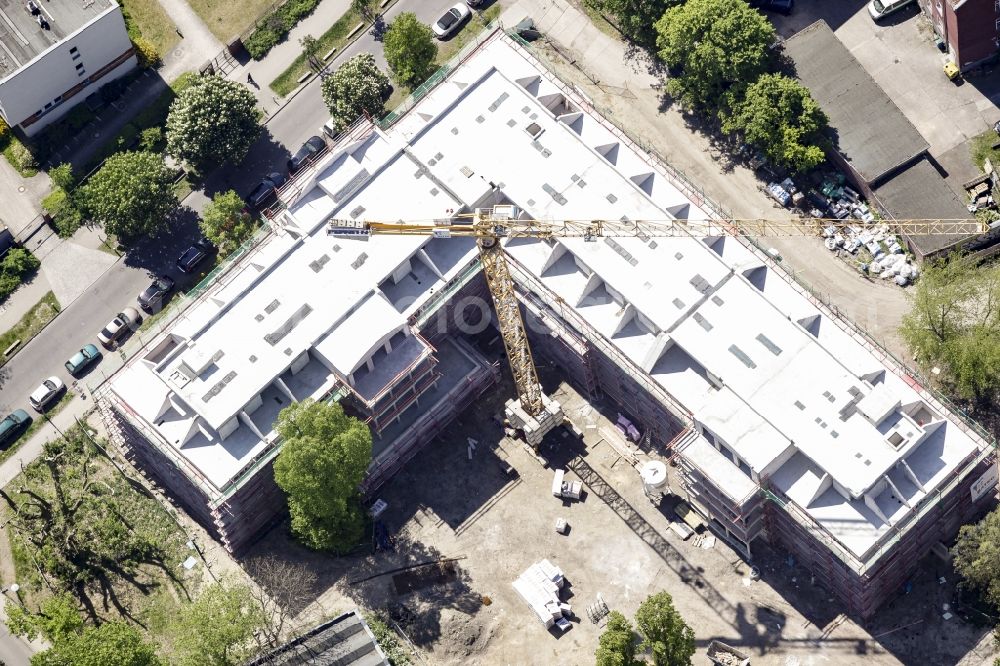 Aerial image Berlin - Construction site of a new DOMICIL care and nursing home for the elderly on Alfred-Kowalke-Strasse in the district of Lichtenberg in Berlin, Germany. Its owner is HBB Hanseatische Gesellschaft fuer Seniorenheime mbH & Co. KG, BATEG GmbH is the main developer