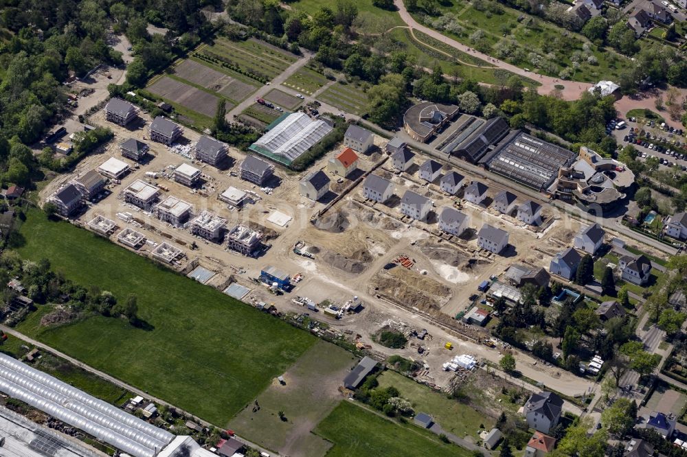 Berlin from the bird's eye view: Construction site of NCC AB for single family and semi-detached house settlement on Mohriner Allee of the Britz part of Berlin in Germany