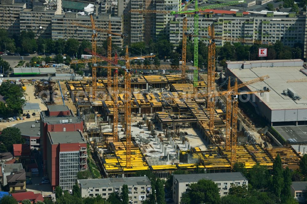 Aerial image Bukarest - Construction site for the new building of the Mega Mall Bucharest at the Pierre de Coubert in Bucharest, Romania