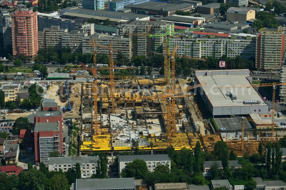 Aerial image Bukarest - Construction site for the new building of the Mega Mall Bucharest at the Pierre de Coubert in Bucharest, Romania