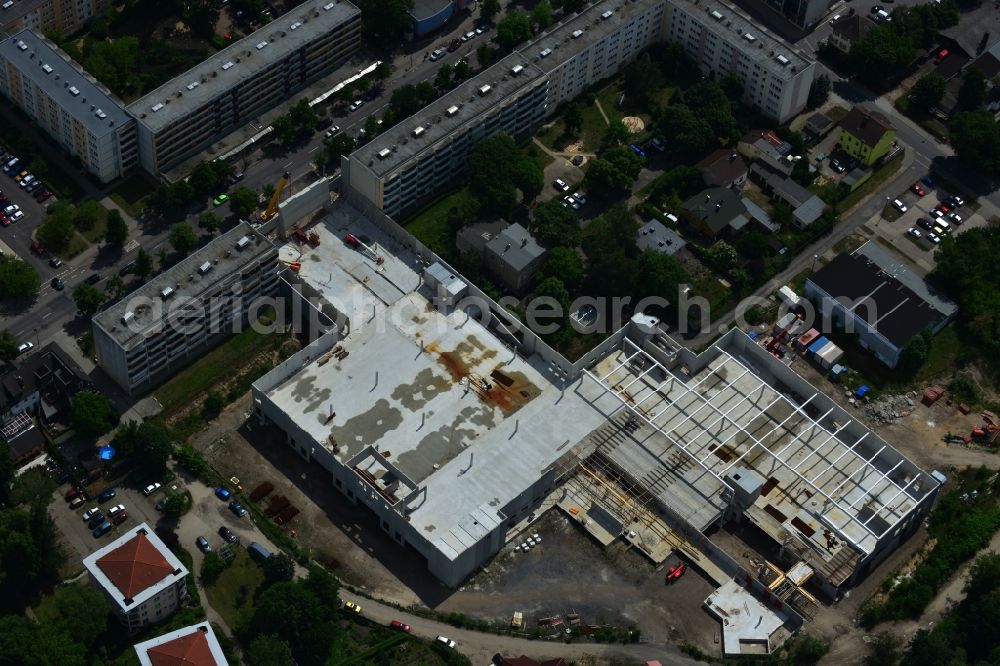 Aerial photograph Erkner - Construction site for the new building of the shopping center City center on Friedrichstrasse - waterfront in Erkner in Brandenburg