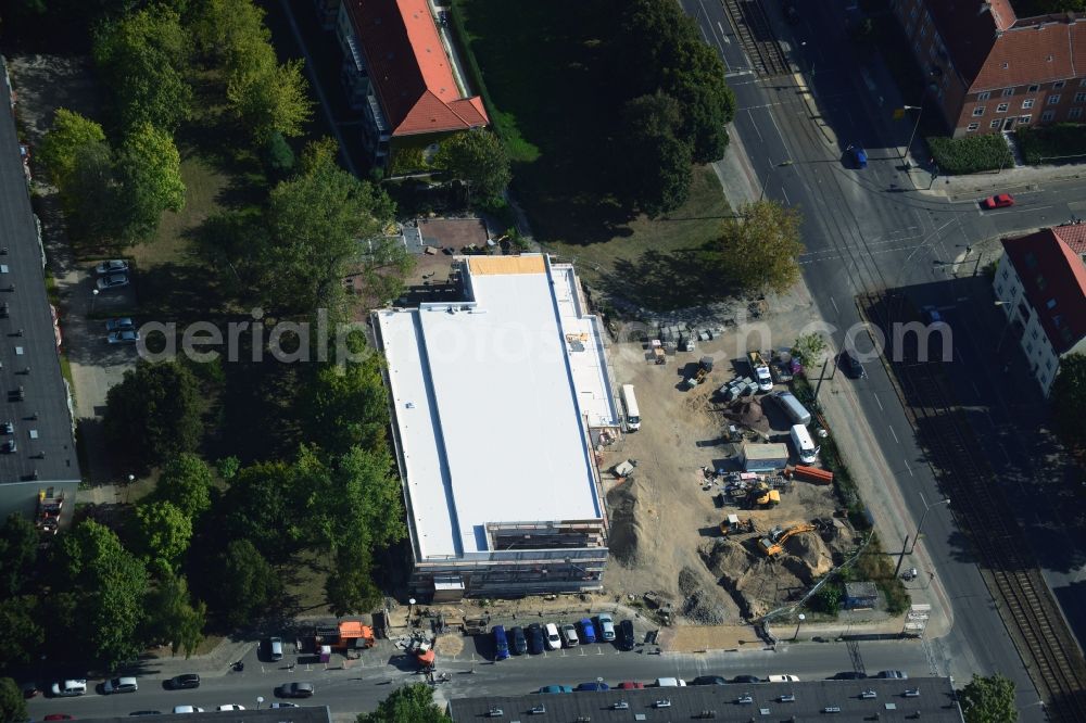 Aerial image Berlin - Construction site to build a new discounter shopping center at the corner Hoernlestrasse Mahlsdorfer street in the Koepenick district of Berlin