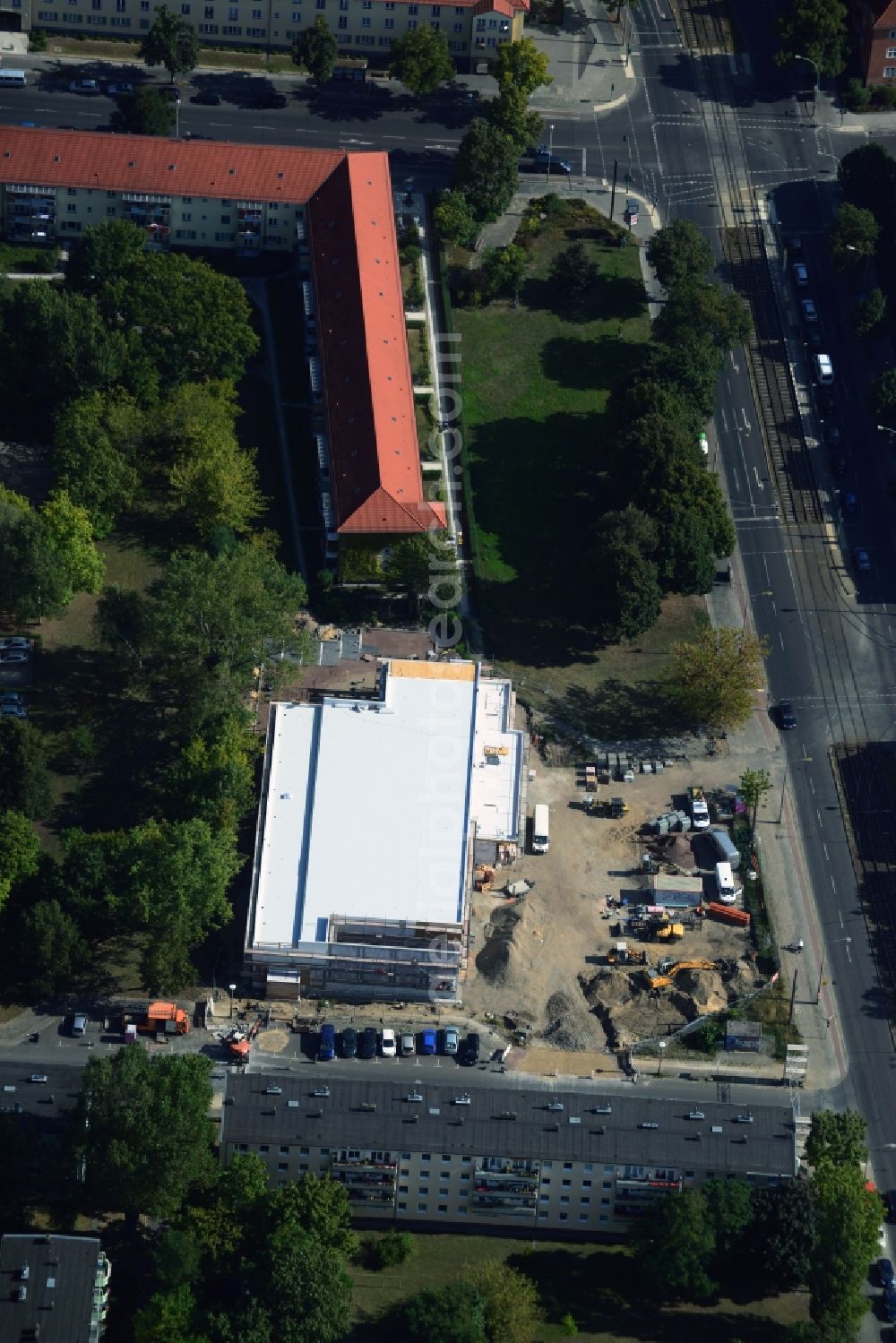 Berlin from above - Construction site to build a new discounter shopping center at the corner Hoernlestrasse Mahlsdorfer street in the Koepenick district of Berlin