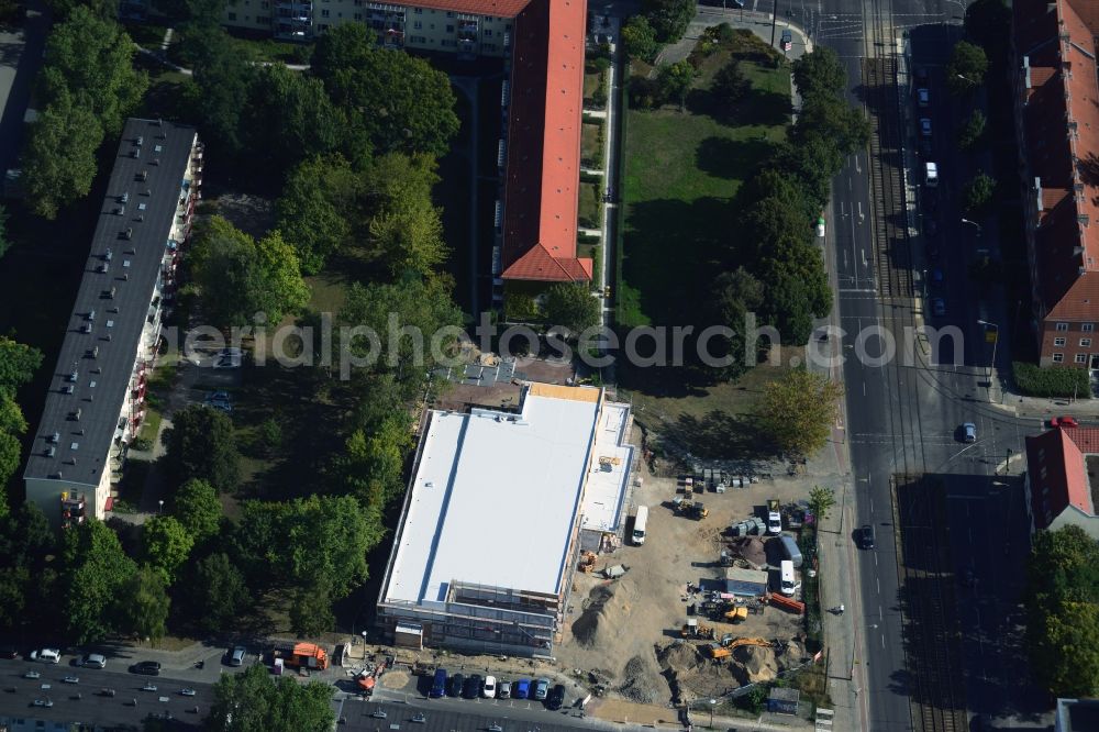 Berlin from the bird's eye view: Construction site to build a new discounter shopping center at the corner Hoernlestrasse Mahlsdorfer street in the Koepenick district of Berlin