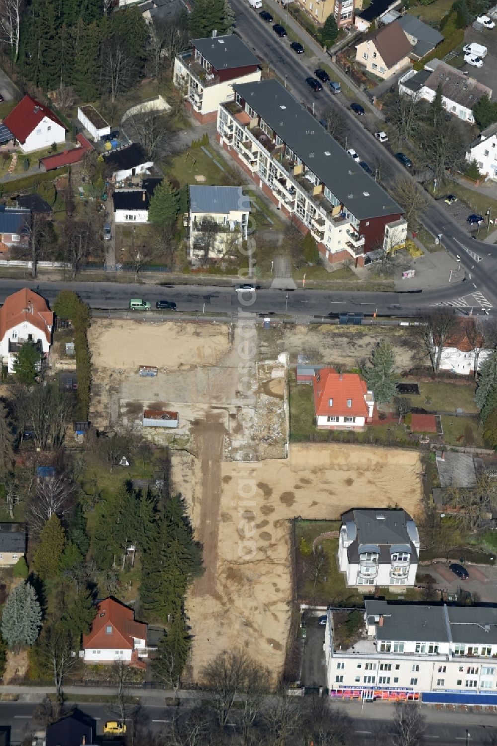 Berlin from the bird's eye view: Construction site for the new building shopping center of Lidl Dienstleistung GmbH & Co. KG destrict Mahlsdorf in Berlin in Germany