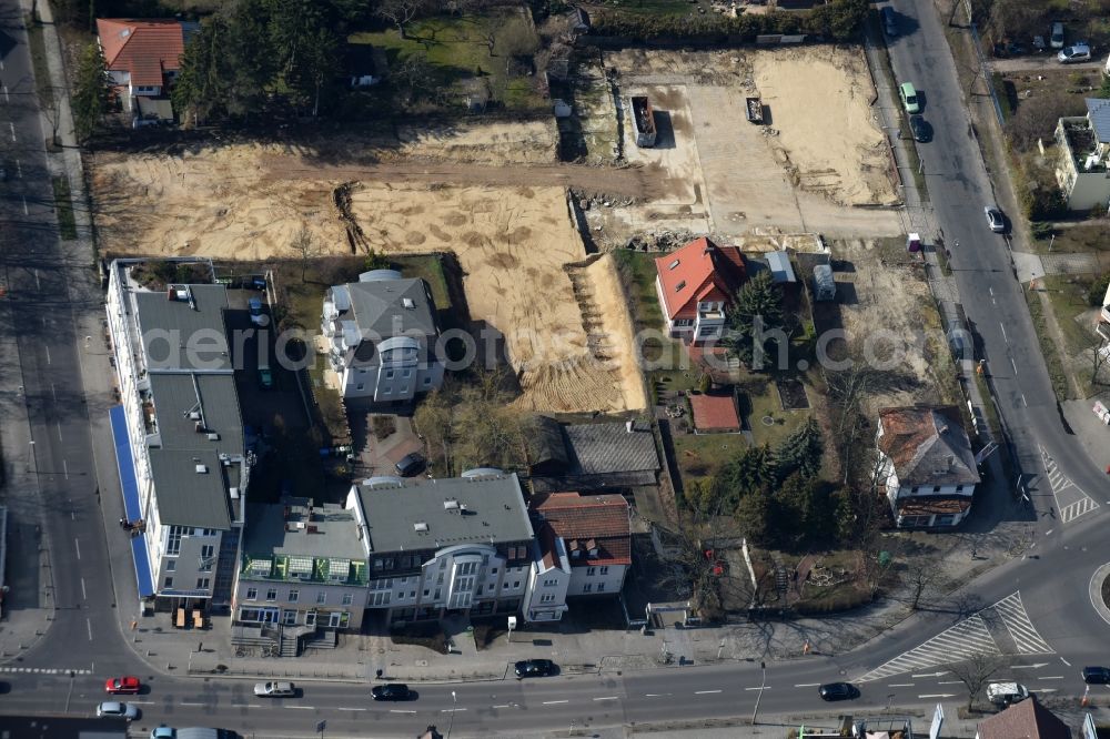 Berlin from the bird's eye view: Construction site for the new building shopping center of Lidl Dienstleistung GmbH & Co. KG destrict Mahlsdorf in Berlin in Germany