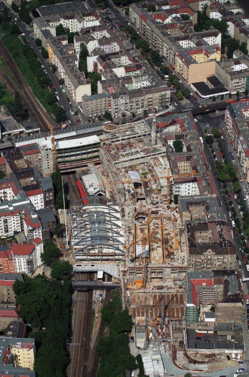 Berlin Prenzlauer Berg from the bird's eye view: Construction site for the new building of the shopping center Schoenhauser Allee on the same S-Bahn station in Berlin Prenzlauer Berg