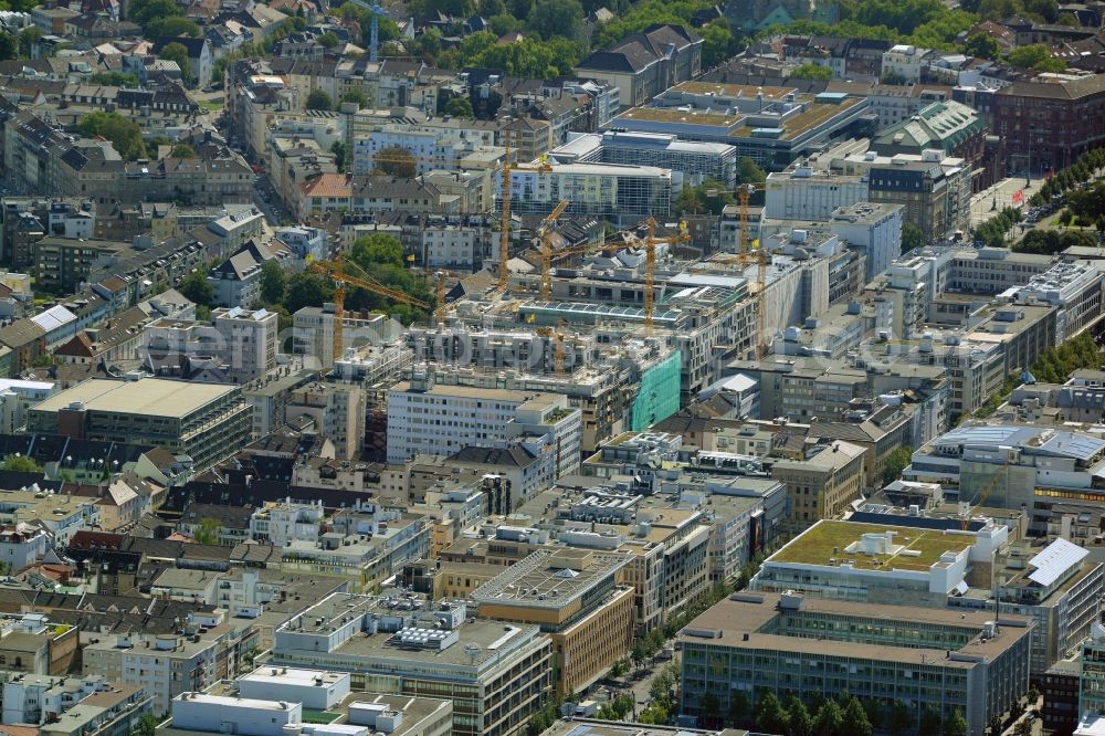 Mannheim from the bird's eye view: Construction site for the new building the shopping center and town quarters Q 6 Q 7 on the future Muenzplatz in Mannheim in the state Baden-Wuerttemberg