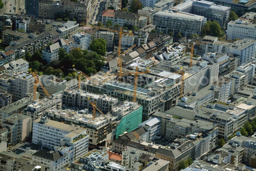 Mannheim from the bird's eye view: Construction site for the new building the shopping center and town quarters Q 6 Q 7 on the future Muenzplatz in Mannheim in the state Baden-Wuerttemberg