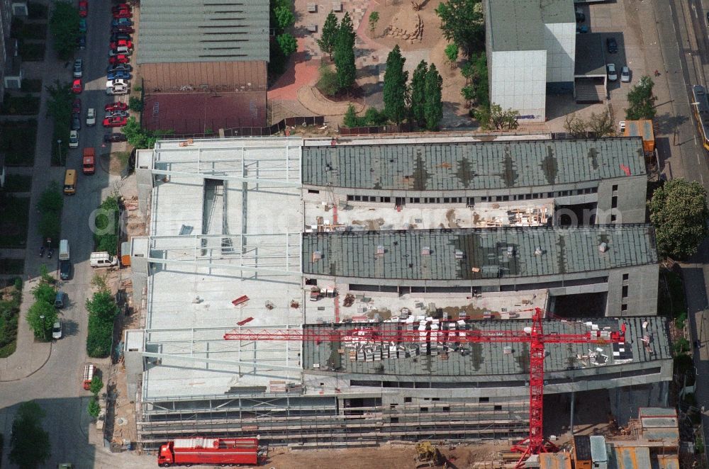 Aerial image Berlin Hohenschönhausen - Construction site for the new building of the shopping center Storchenhof MÜBAU Baugesellschaft mbH on the Hauptstrasse in Berlin - Hohenschonhausen