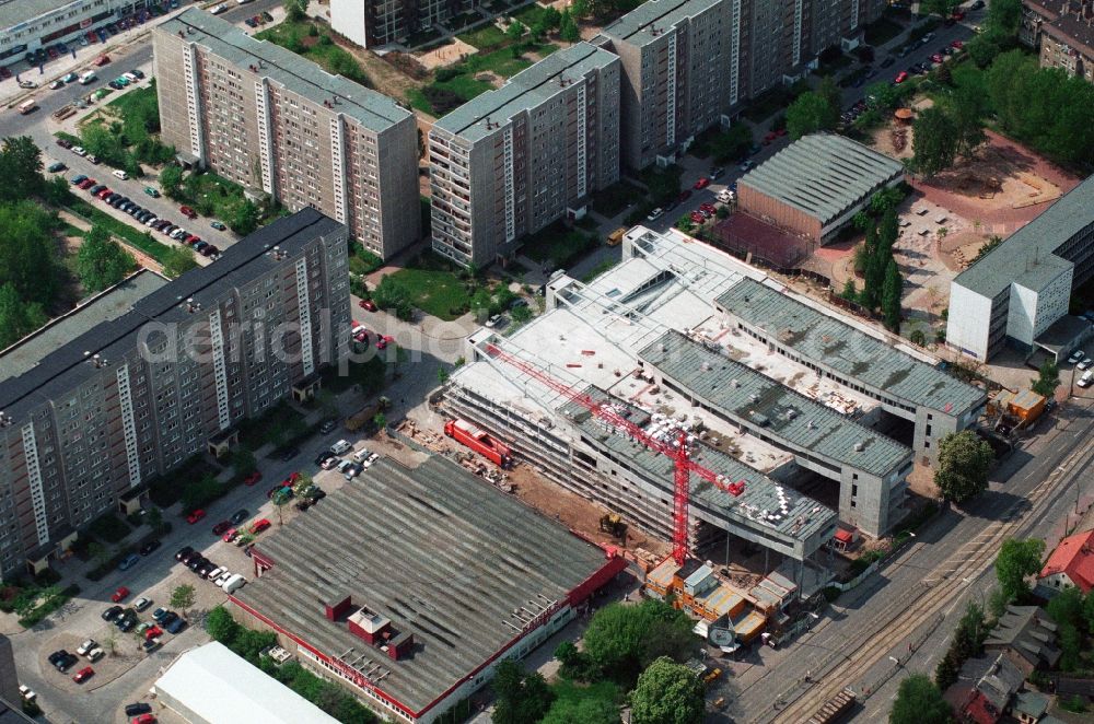 Aerial photograph Berlin Hohenschönhausen - Construction site for the new building of the shopping center Storchenhof MÜBAU Baugesellschaft mbH on the Hauptstrasse in Berlin - Hohenschonhausen