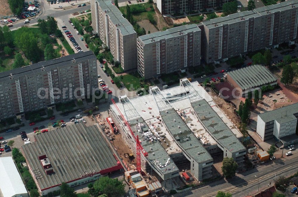 Berlin Hohenschönhausen from above - Construction site for the new building of the shopping center Storchenhof MÜBAU Baugesellschaft mbH on the Hauptstrasse in Berlin - Hohenschonhausen