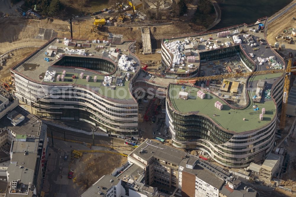 Aerial photograph Düsseldorf - DUSSELDORF 16/08/2012 The construction site for the construction of a new retail and office property Koe-arch in Dusseldorf in North Rhine-Westphalia. Between Königsallee boulevard and Hofgarten Schadowplatz, built the company Zechbau two 26-meter-high building complexes for retail and offices