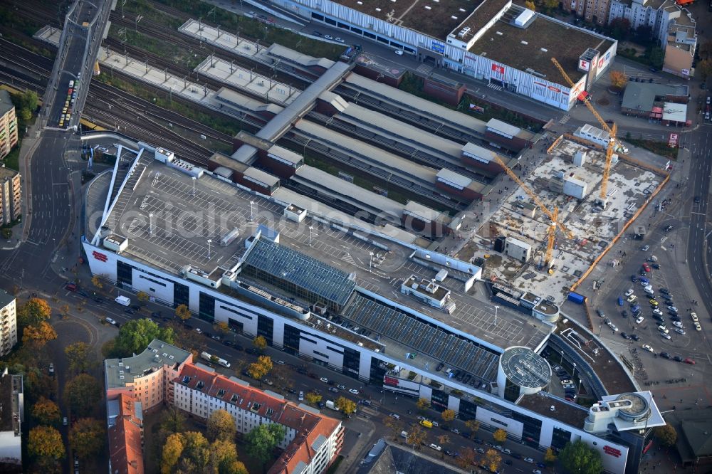 Berlin from the bird's eye view: Construction site to build a new reception building at the train station Gesundbrunnen in Berlin Wedding