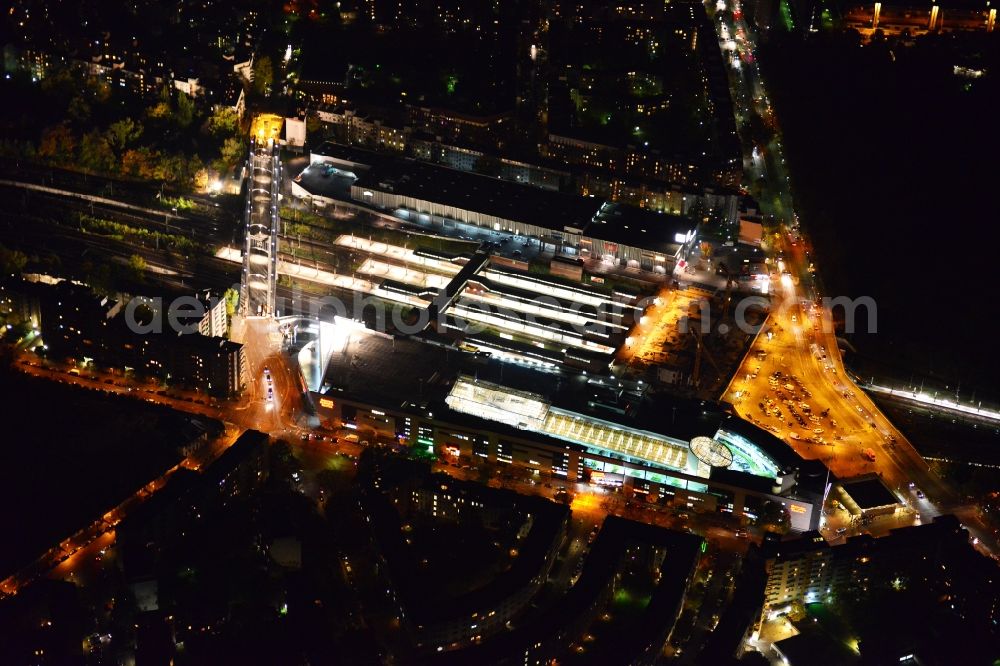 Berlin from above - Night view of Construction site to build a new reception building at the train station Gesundbrunnen in Berlin Wedding