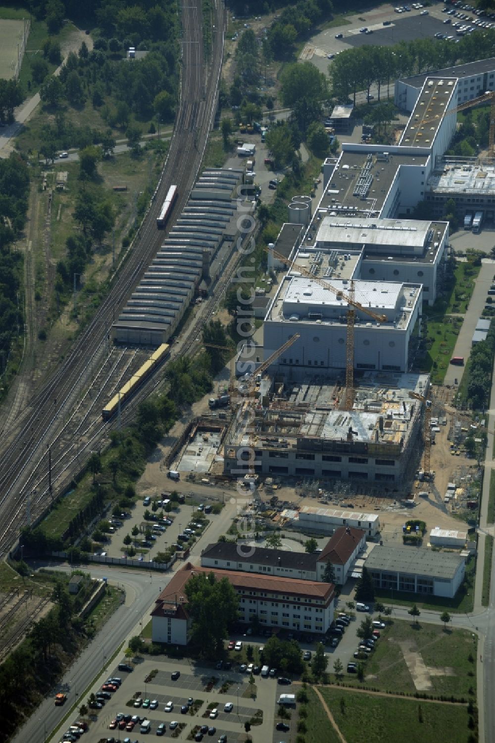 Aerial image Oranienburg - Construction site for the new construction and expansion of Takeda GmbH at the Lehnitzstrasse in Oranienburg in Brandenburg. The construction company Ed. Zueblin AG built on the site of the pharmaceutical company at the Lehnitzstrasse a modern production and research facilities