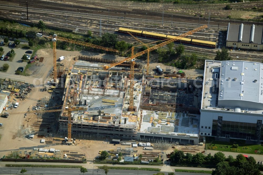 Oranienburg from the bird's eye view: Construction site for the new construction and expansion of Takeda GmbH at the Lehnitzstrasse in Oranienburg in Brandenburg. The construction company Ed. Zueblin AG built on the site of the pharmaceutical company at the Lehnitzstrasse a modern production and research facilities