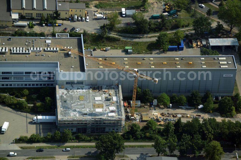 Aerial photograph Oranienburg - Construction site for the new construction and expansion of Takeda GmbH at the Lehnitzstrasse in Oranienburg in Brandenburg. The construction company Ed. Zueblin AG built on the site of the pharmaceutical company at the Lehnitzstrasse a modern production and research facilities