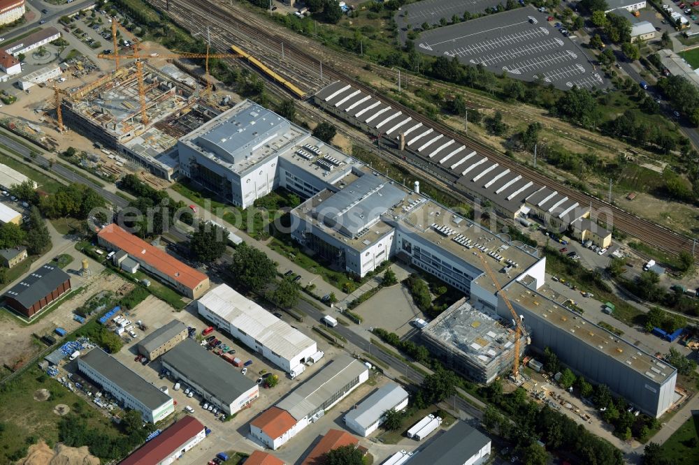 Oranienburg from the bird's eye view: Construction site for the new construction and expansion of Takeda GmbH at the Lehnitzstrasse in Oranienburg in Brandenburg. The construction company Ed. Zueblin AG built on the site of the pharmaceutical company at the Lehnitzstrasse a modern production and research facilities