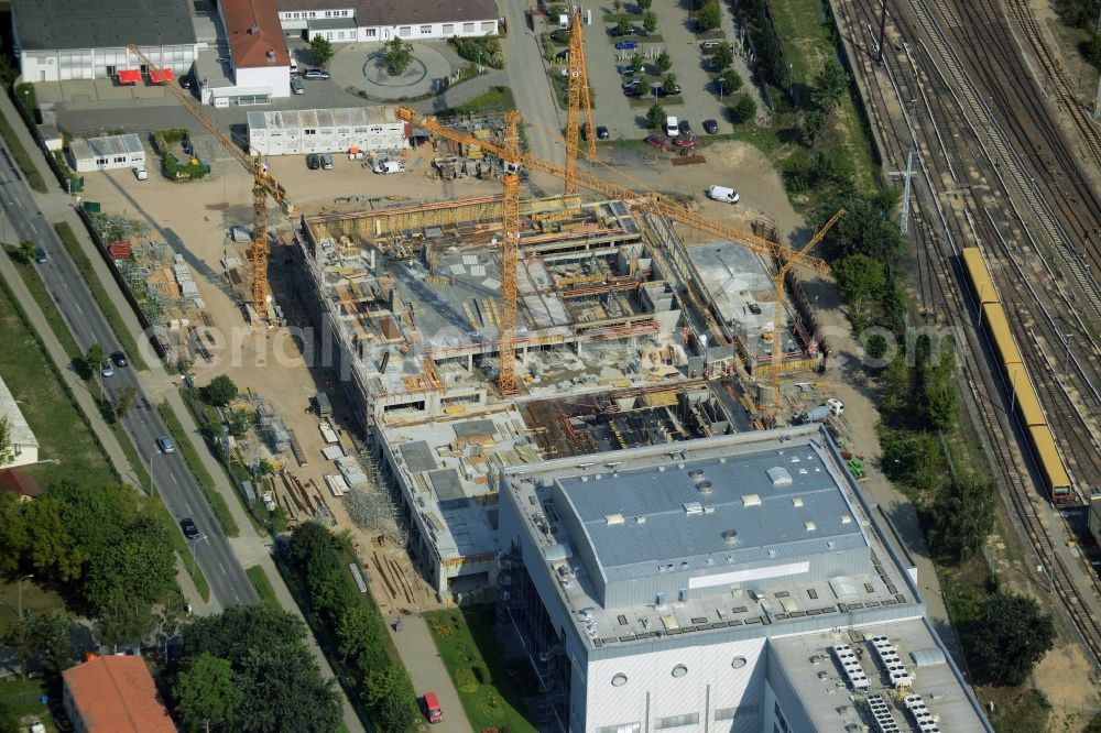 Aerial photograph Oranienburg - Construction site for the new construction and expansion of Takeda GmbH at the Lehnitzstrasse in Oranienburg in Brandenburg. The construction company Ed. Zueblin AG built on the site of the pharmaceutical company at the Lehnitzstrasse a modern production and research facilities