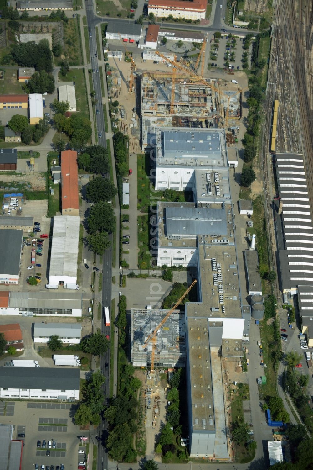 Oranienburg from above - Construction site for the new construction and expansion of Takeda GmbH at the Lehnitzstrasse in Oranienburg in Brandenburg. The construction company Ed. Zueblin AG built on the site of the pharmaceutical company at the Lehnitzstrasse a modern production and research facilities