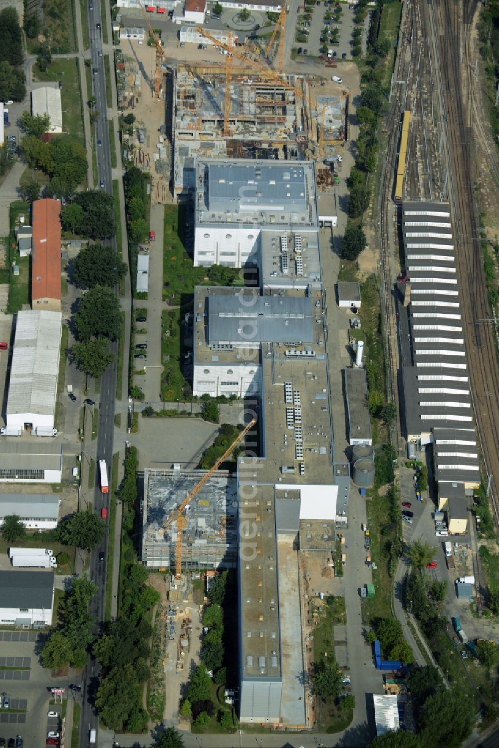 Oranienburg from the bird's eye view: Construction site for the new construction and expansion of Takeda GmbH at the Lehnitzstrasse in Oranienburg in Brandenburg. The construction company Ed. Zueblin AG built on the site of the pharmaceutical company at the Lehnitzstrasse a modern production and research facilities