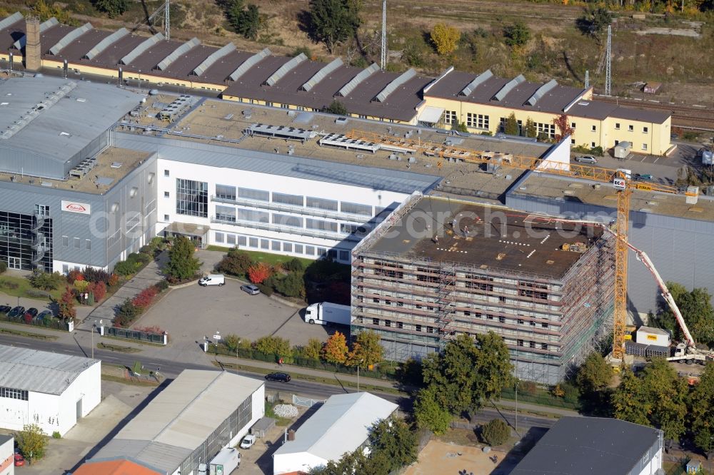 Oranienburg from above - Construction site for the new construction and expansion of Takeda GmbH at the Lehnitzstrasse in Oranienburg in Brandenburg. The construction company Ed. Zueblin AG built on the site of the pharmaceutical company at the Lehnitzstrasse a modern production and research facilities