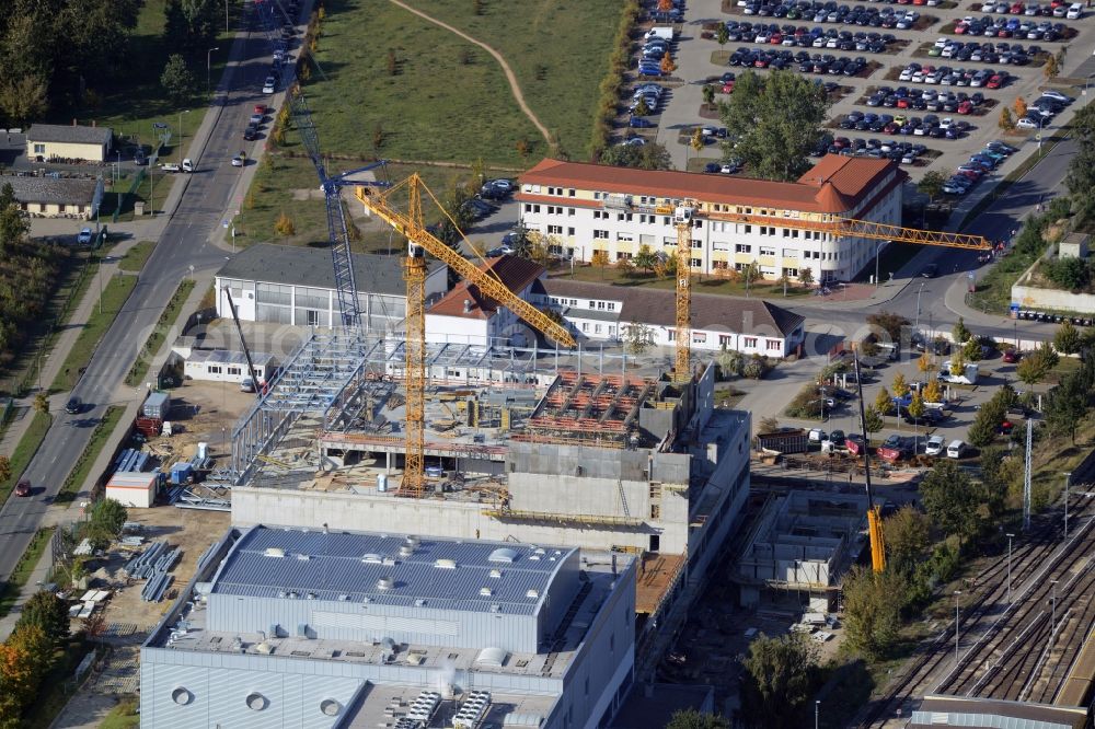 Oranienburg from the bird's eye view: Construction site for the new construction and expansion of Takeda GmbH at the Lehnitzstrasse in Oranienburg in Brandenburg. The construction company Ed. Zueblin AG built on the site of the pharmaceutical company at the Lehnitzstrasse a modern production and research facilities