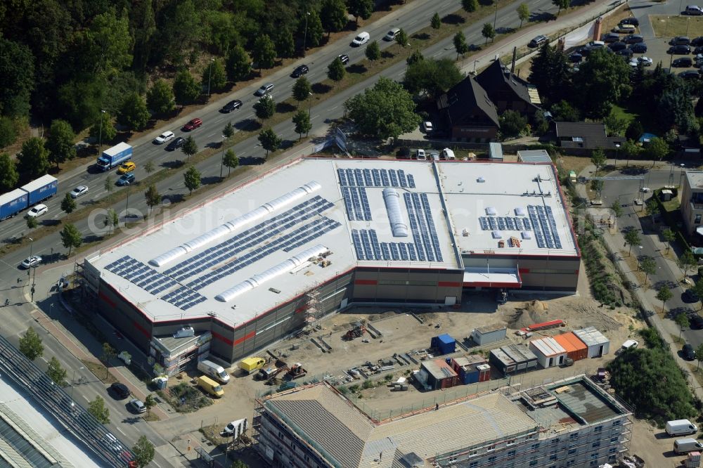 Berlin from the bird's eye view: Construction site for the new building of a store on B1/B5 Alt-Biesdorf road in the Biesdorf part of the district of Marzahn-Hellersdorf in Berlin in Germany