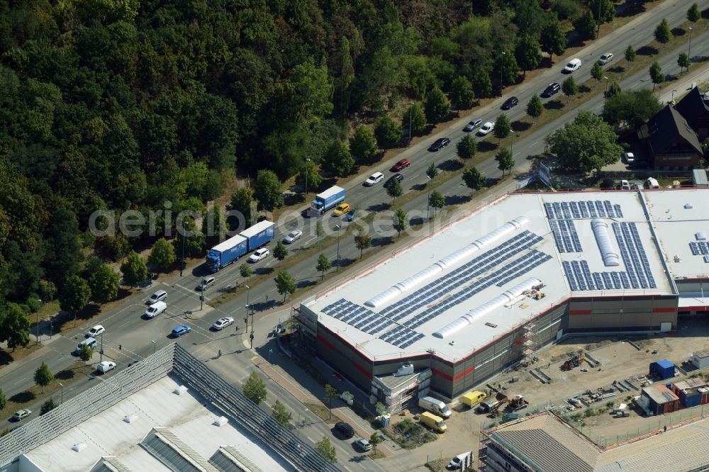 Aerial image Berlin - Construction site for the new building of a store on B1/B5 Alt-Biesdorf road in the Biesdorf part of the district of Marzahn-Hellersdorf in Berlin in Germany