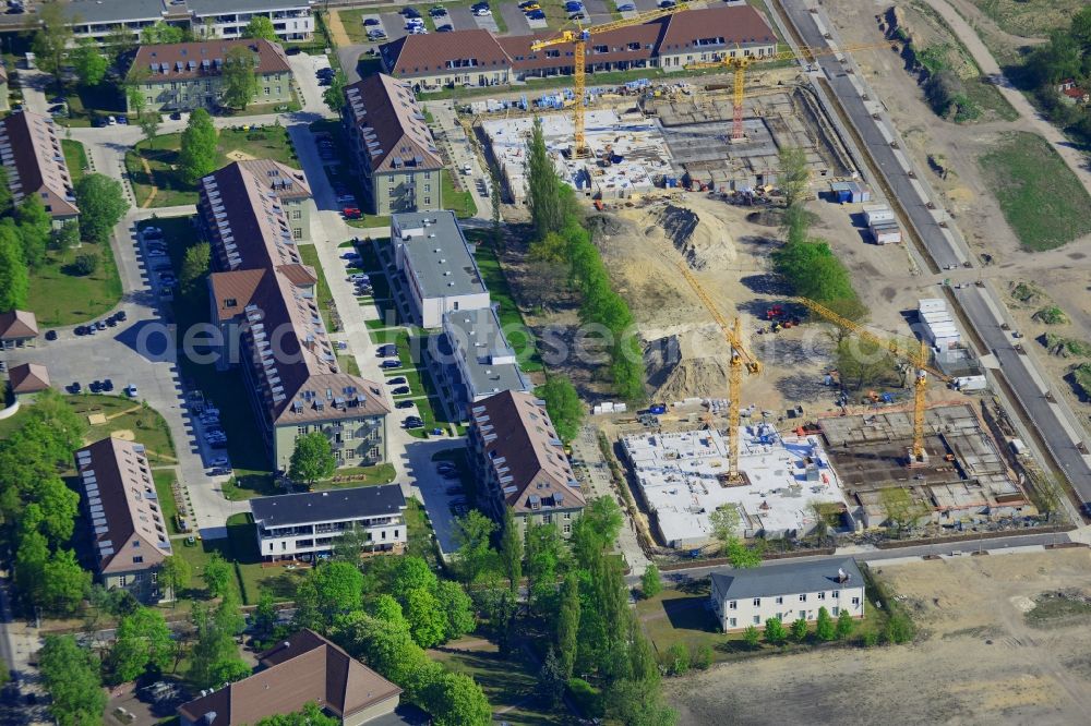 Aerial photograph Berlin - Construction site for a residential area in Karlshorst in the Lichtenberg district of Berlin in Germany. The development of InCasa project with semi-detached houses and residential areas is located on site of the historic military base in Karlshorst