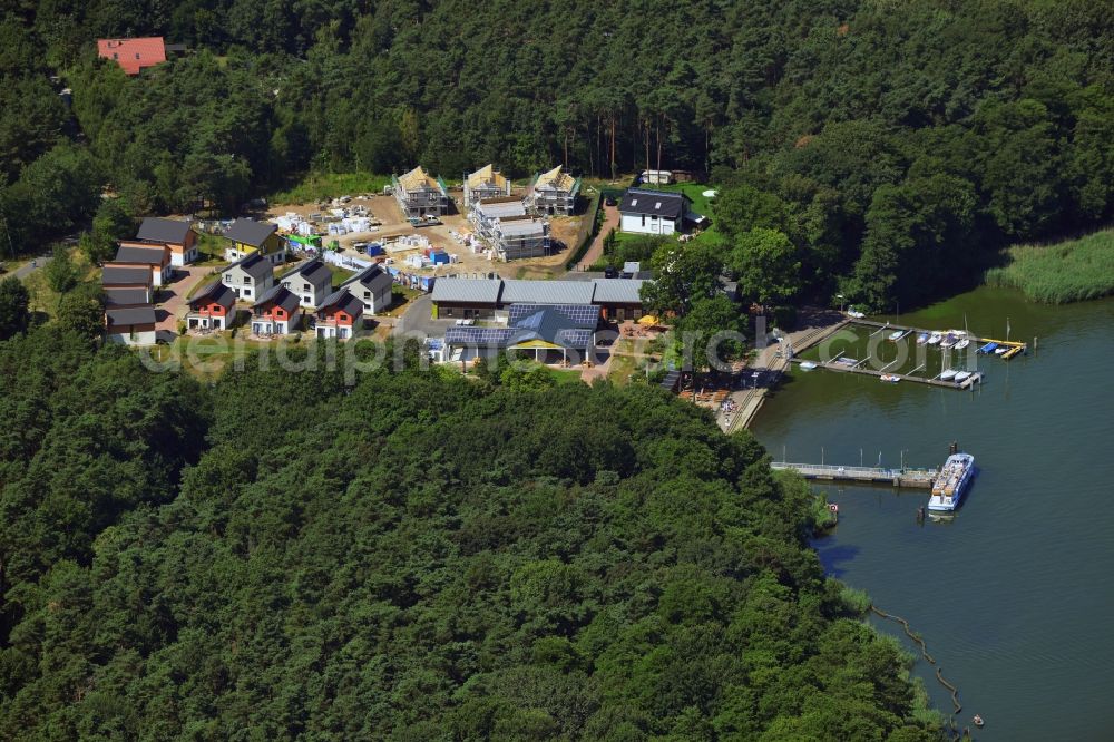 Berlin from above - Construction site of the new Rubezahl holiday park on the banks of Mueggelsee in Berlin