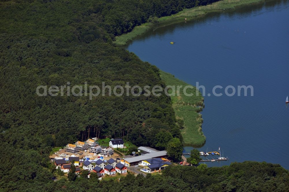 Aerial photograph Berlin - Construction site of the new Rubezahl holiday park on the banks of Mueggelsee in Berlin