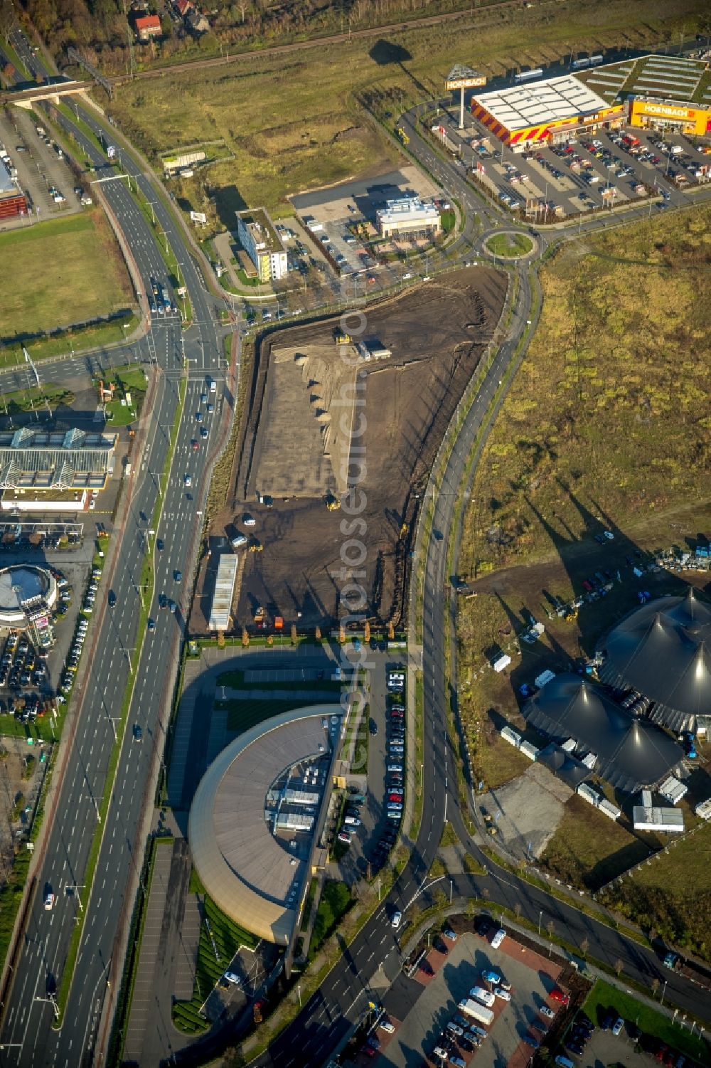 Oberhausen from the bird's eye view: Construction site for the new building of a branch and administrative building of the workwearstore Engelbert Strauss in Oberhausen in the state of North Rhine-Westphalia