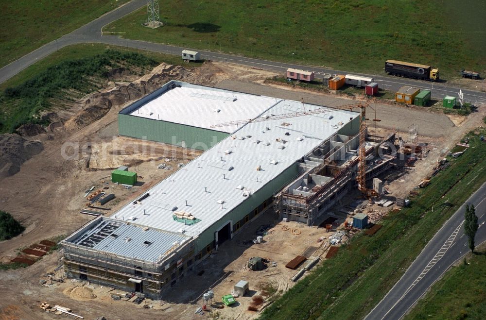 Forst from above - Construction site for a new company building in the industrial area on the ring road of the B112 in Forst in Brandenburg