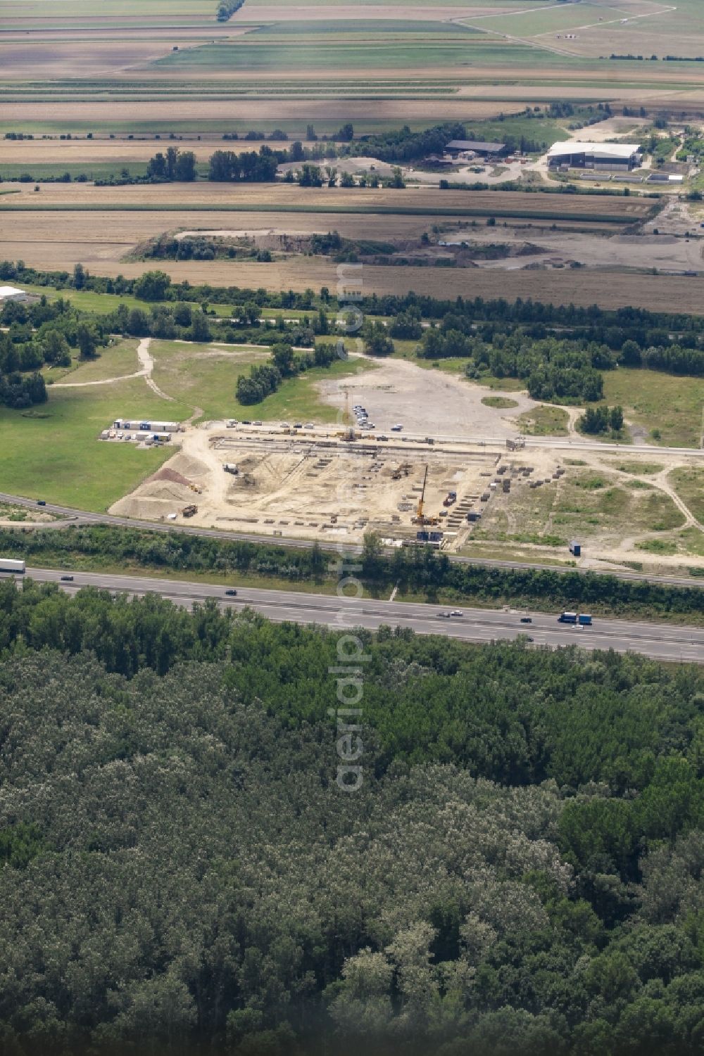 Fischamend-Dorf from above - Construction site of the headquarters of Makita Austria in the commercial area Airport City in Fischamend-Dorf in Lower Austria, Austria