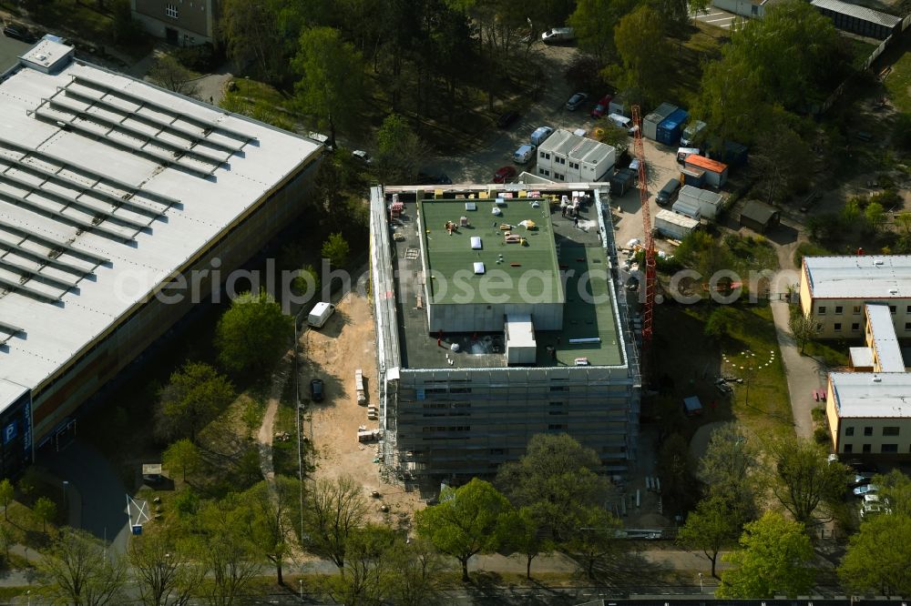 Rostock from the bird's eye view: Construction site for the new building of a research building and office complex Biomedicum along the Kopernikusstrasse on the Schillingallee Campus in Rostock in the state Mecklenburg - Western Pomerania, Germany