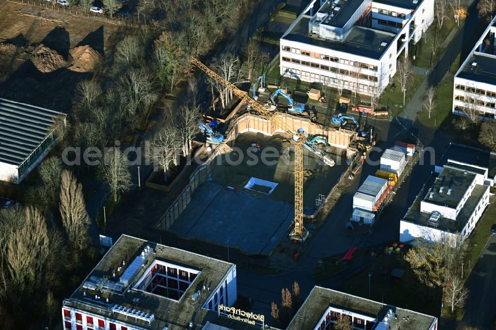 Berlin from the bird's eye view: Construction site for the new building of a research building and office complex auf Biotech-Park in the district Buch in Berlin, Germany